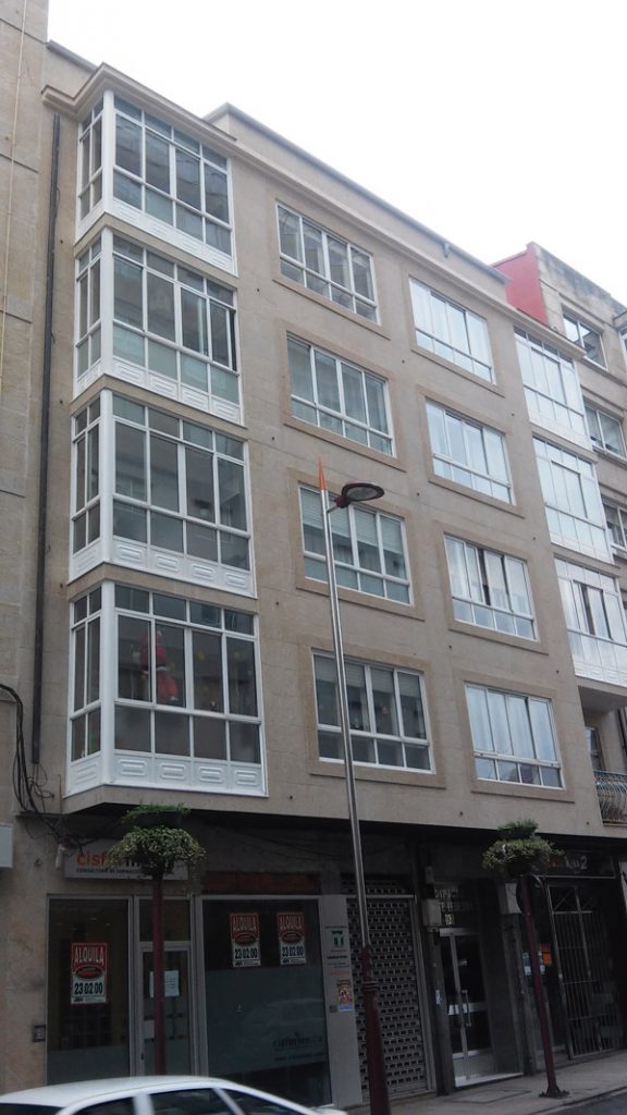 Renovación de fachada en bloque de viviendas - Taco santiago